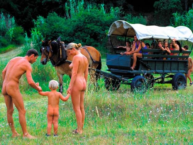 Family naturism in a forest clearing in the open air video